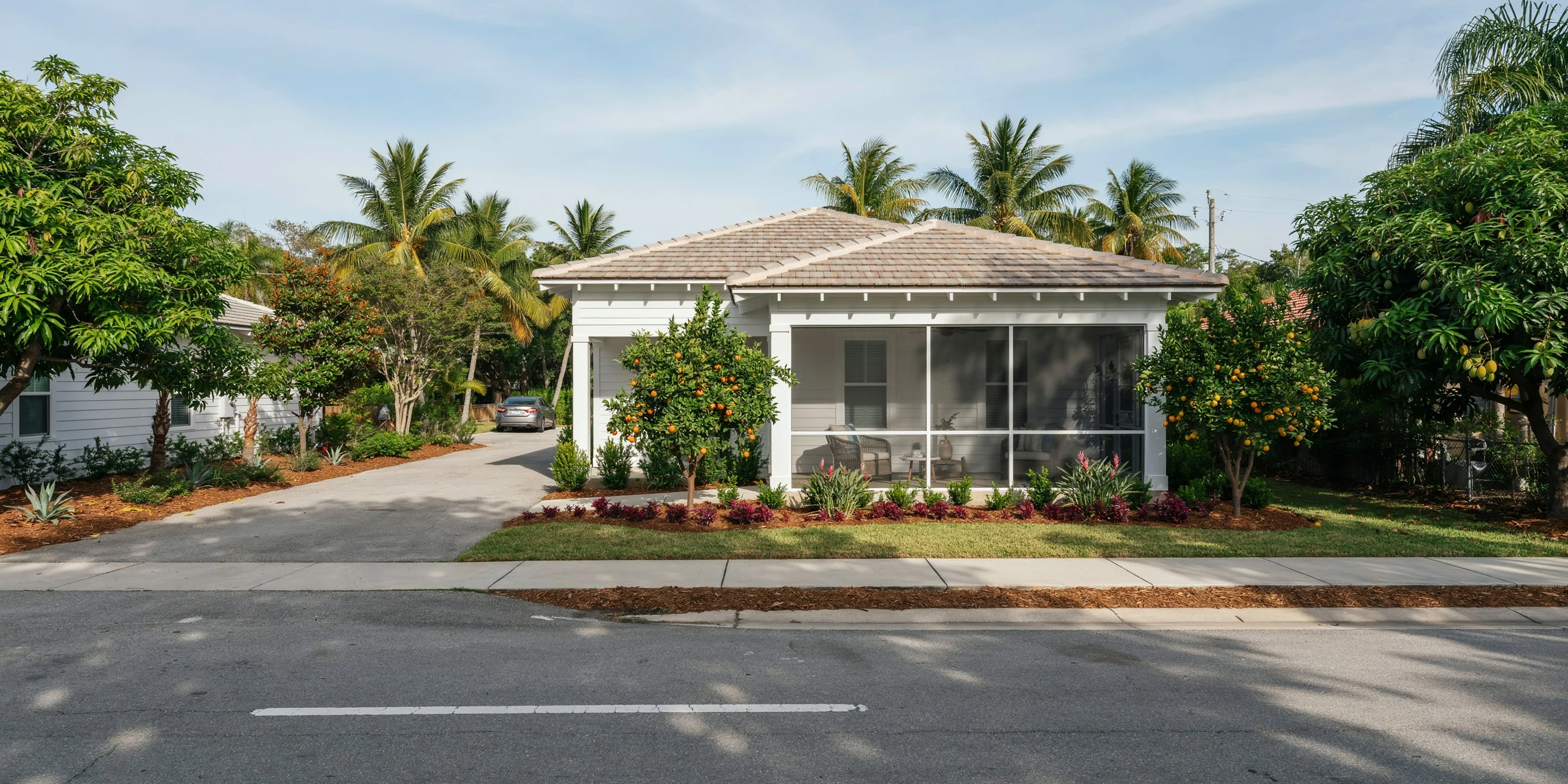 Cottage with screened porch on a quiet street in Arlington Park, Sarasota, FL