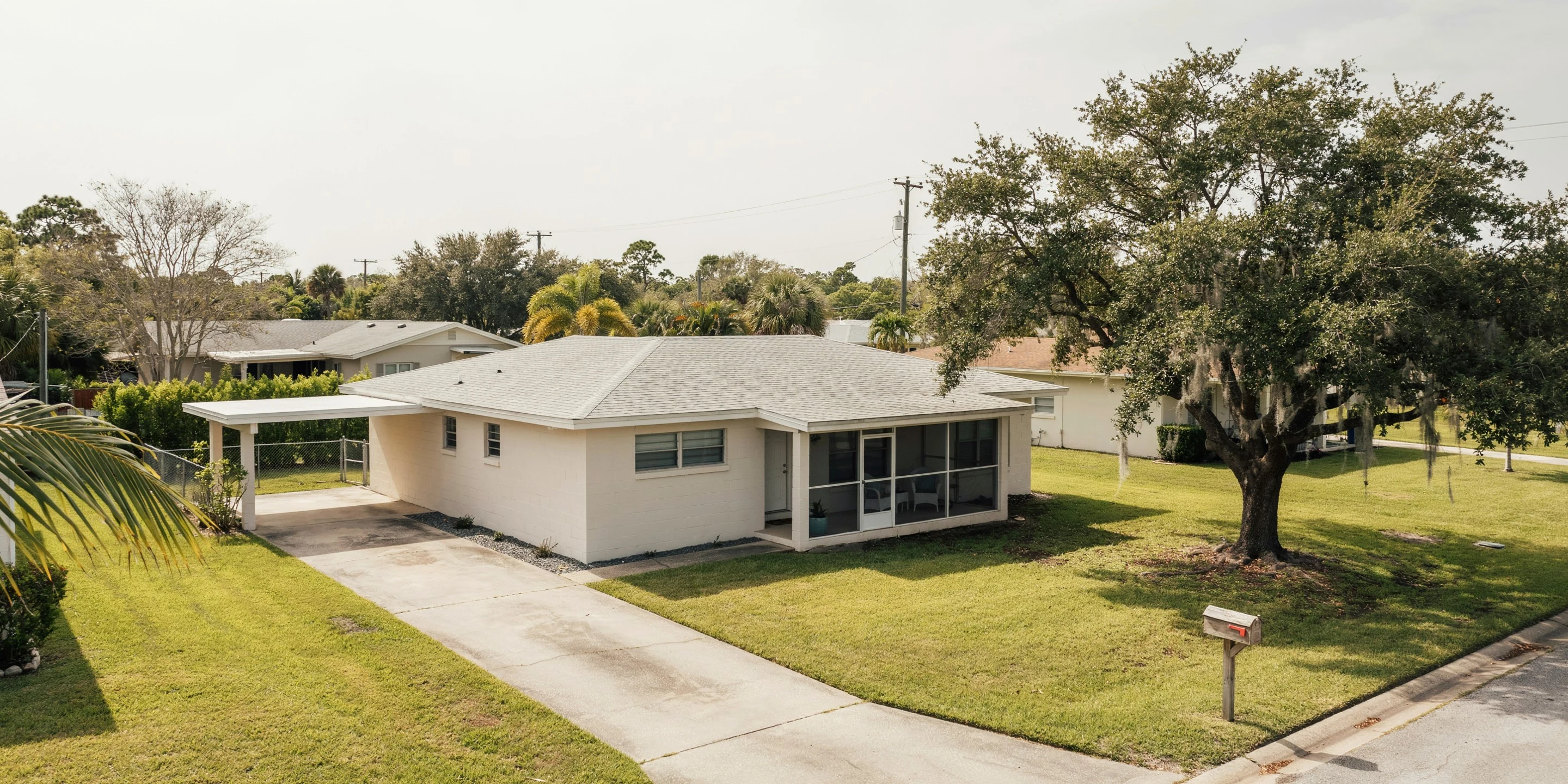 1960s ranch home with pool cage in Gulf Gate Estates, Sarasota, FL
